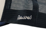 Rewired 2.0 R Trucker Cap - Navy/White - Side Script Logo